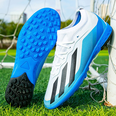 Al por mayor Calzado de fútbol de punta baja para niños AG Long Spikes Copa del Mundo TF Broken Spikes Calzado de entrenamiento de competición de hierba