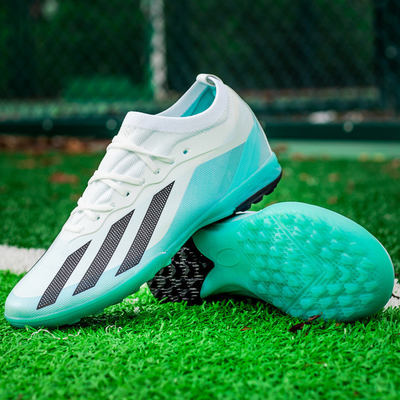 Al por mayor Calzado de fútbol de punta baja para niños AG Long Spikes Copa del Mundo TF Broken Spikes Calzado de entrenamiento de competición de hierba