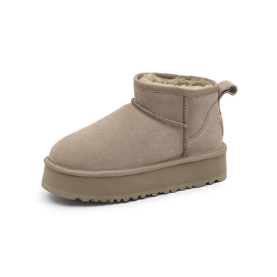 Botas de nieve de piel de vaca de invierno más de terciopelo botas cortas de cuero genuino impermeable antideslizante calzado de algodón al aire libre para niños