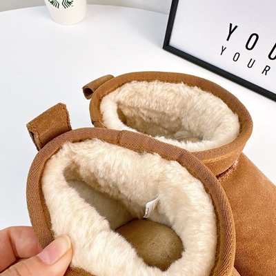 Botas de nieve de piel de vaca de invierno más de terciopelo botas cortas de cuero genuino impermeable antideslizante calzado de algodón al aire libre para niños